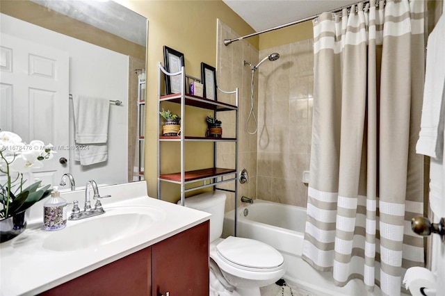 full bathroom with vanity, toilet, and shower / tub combo