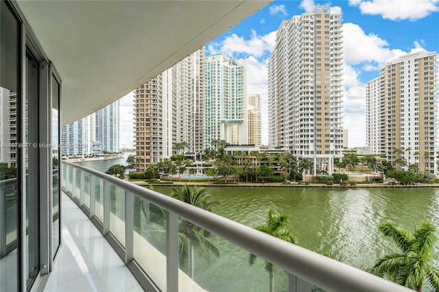 balcony featuring a water view