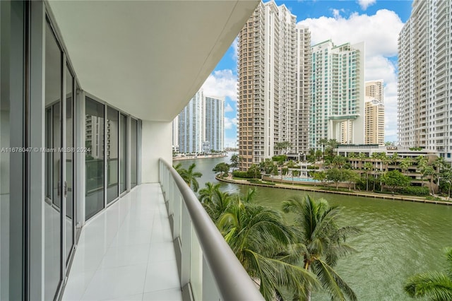 balcony featuring a water view