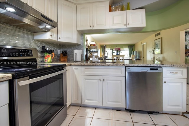 kitchen featuring kitchen peninsula, white cabinetry, stainless steel appliances, and sink