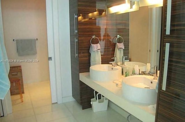 bathroom with vanity and tile patterned floors