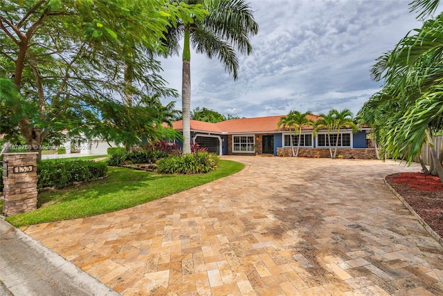 view of front of home with a garage