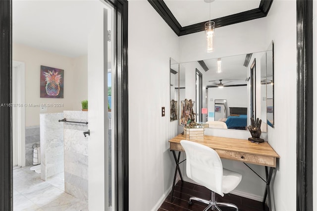 office space with ornamental molding and ceiling fan