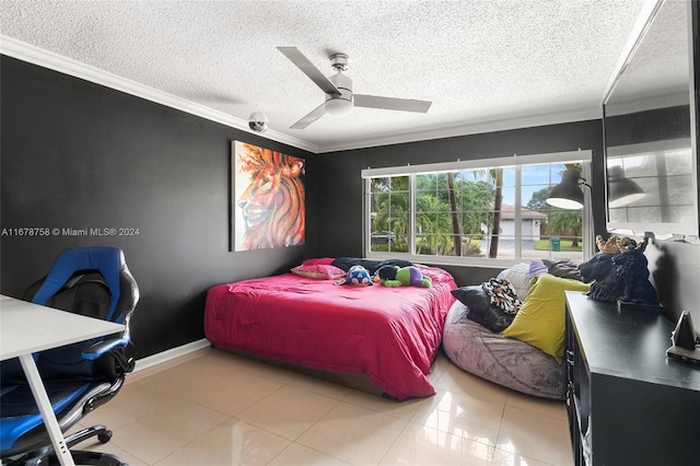 bedroom featuring ceiling fan, crown molding, a textured ceiling, and light tile patterned floors