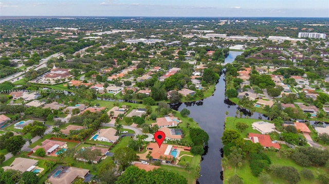 bird's eye view with a water view