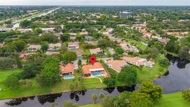 drone / aerial view with a water view