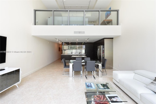 living room featuring rail lighting