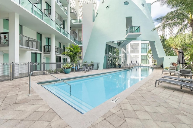 view of pool featuring a patio