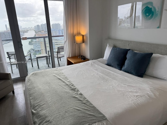 bedroom with hardwood / wood-style floors