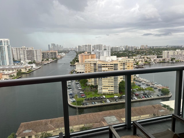 balcony featuring a water view