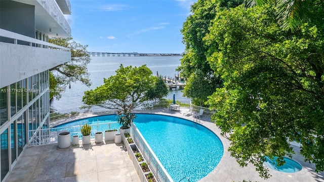 1627 Brickell Ave Unit 1906, Miami, FL 33129 - view of swimming pool with a water view and a patio area