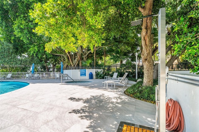 1627 Brickell Ave Unit 1906, Miami, FL 33129 - community pool with a patio area