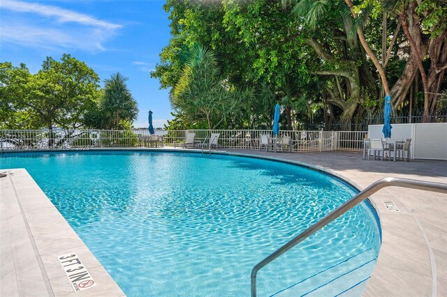 1627 Brickell Ave Unit 1906, Miami, FL 33129 - community pool featuring a patio area