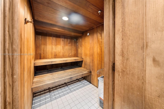 1627 Brickell Ave Unit 1906, Miami, FL 33129 - relaxing sauna / steam room with tile patterned flooring, wood walls, and wooden ceiling