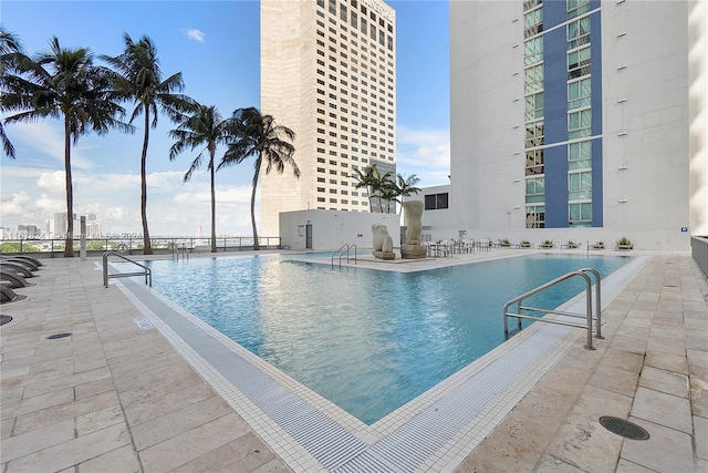 view of pool featuring a patio area