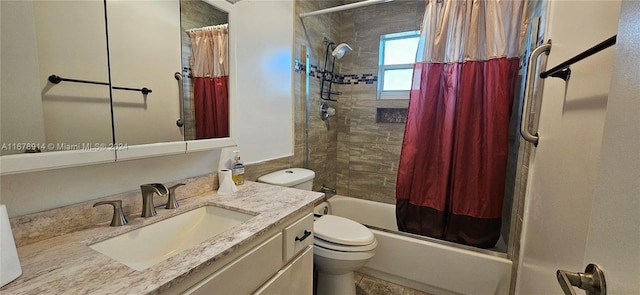 full bathroom featuring vanity, shower / tub combo with curtain, and toilet