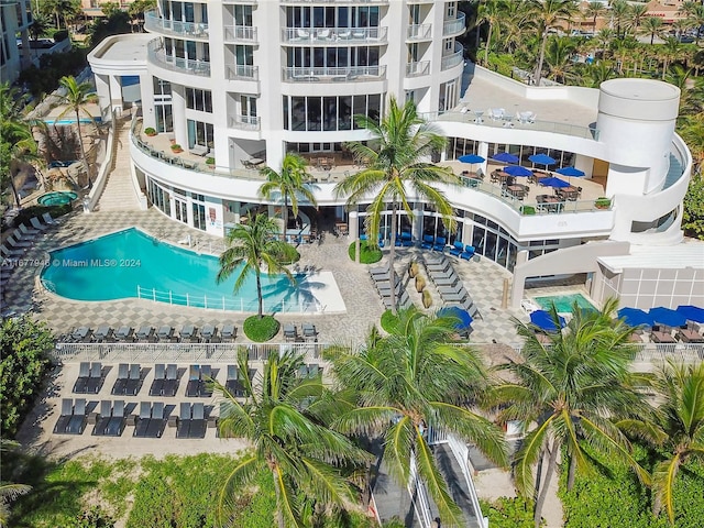 view of swimming pool with a patio