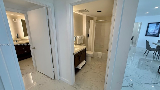 full bathroom featuring vanity, shower / tub combo with curtain, and toilet