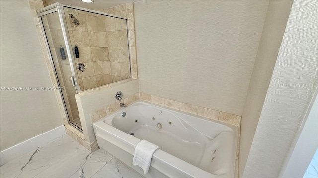 bathroom with shower with separate bathtub