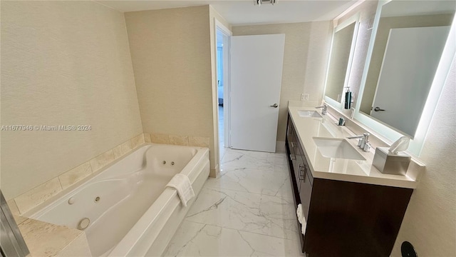 bathroom featuring vanity and a bathtub