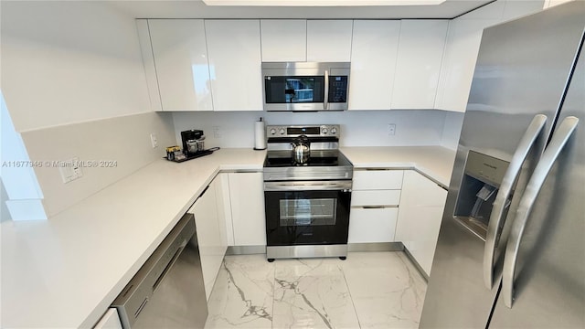 kitchen with white cabinets and stainless steel appliances