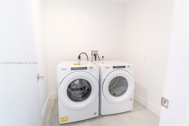 washroom featuring separate washer and dryer