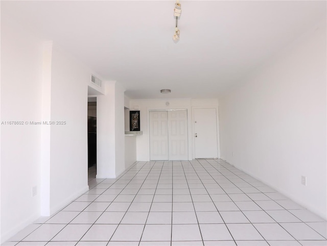 view of tiled spare room