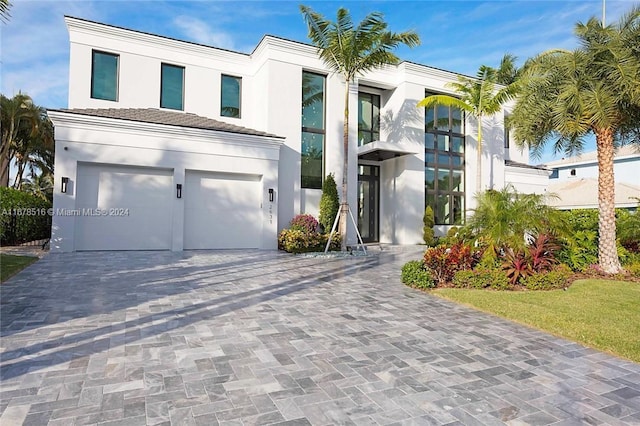 view of front of property with a garage