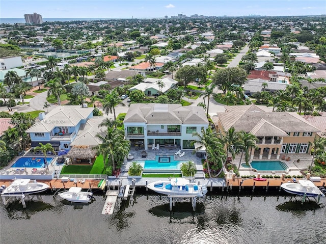 drone / aerial view featuring a water view