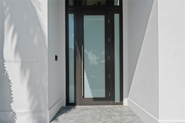 doorway to property featuring french doors