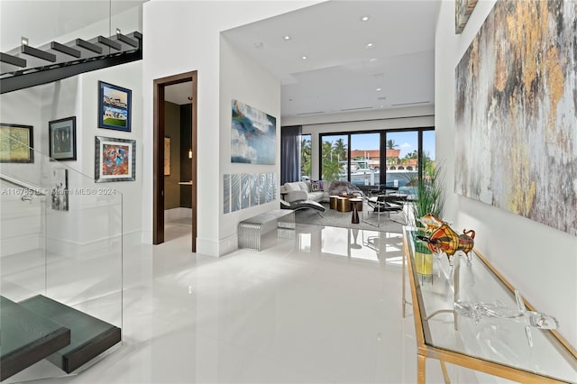 hall featuring french doors and tile patterned flooring