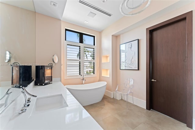 bathroom featuring dual sinks and a washtub