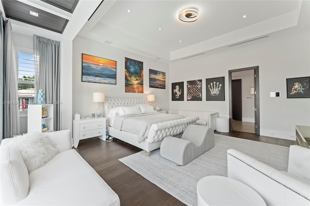 bedroom featuring dark hardwood / wood-style flooring