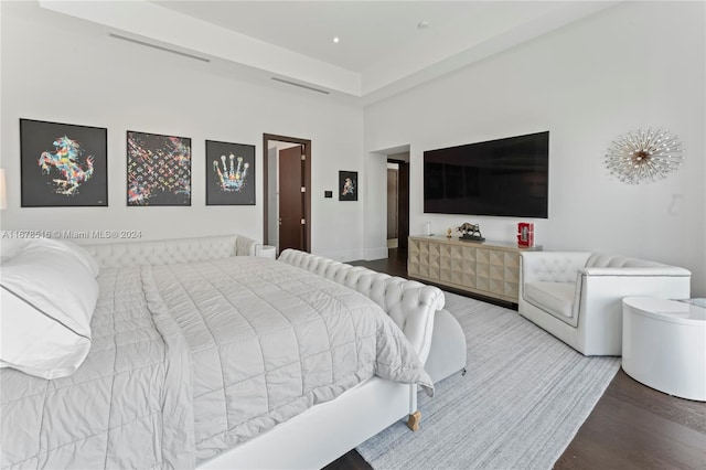 bedroom featuring hardwood / wood-style flooring