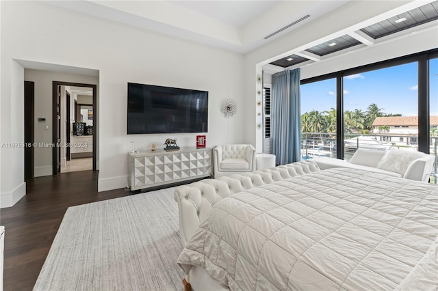 bedroom featuring wood-type flooring