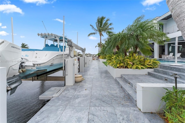 exterior space featuring a dock and a pool