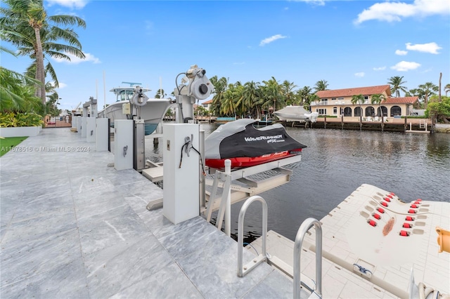 dock area featuring a water view