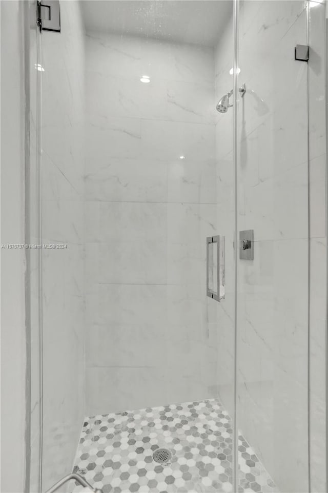 bathroom with an enclosed shower