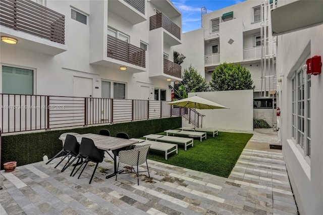 view of patio / terrace featuring a balcony