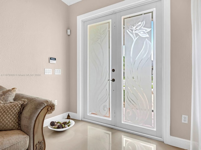9026 NW 173rd Ter, Hialeah, FL 33018 - entryway featuring baseboards