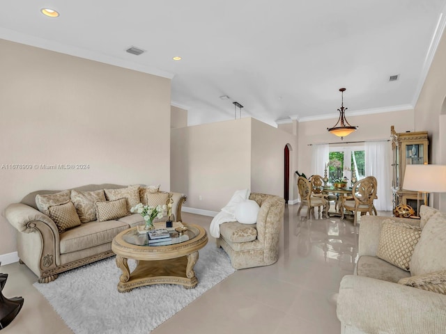 9026 NW 173rd Ter, Hialeah, FL 33018 - living area featuring ornamental molding, arched walkways, recessed lighting, and light tile patterned floors