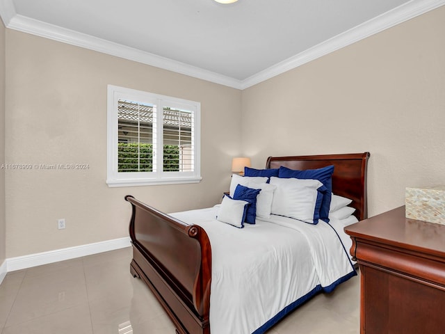 bedroom featuring crown molding