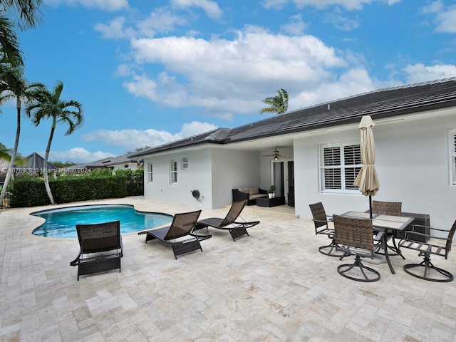 9026 NW 173rd Ter, Hialeah, FL 33018 - view of swimming pool with an outdoor living space, a ceiling fan, a patio, and outdoor dining space