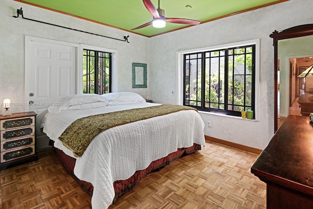 bedroom with parquet flooring and ceiling fan