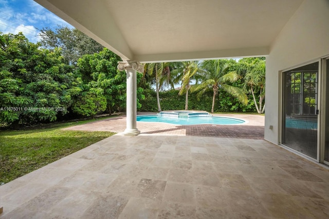 view of pool featuring a patio