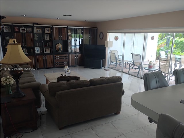 living room with light tile patterned floors