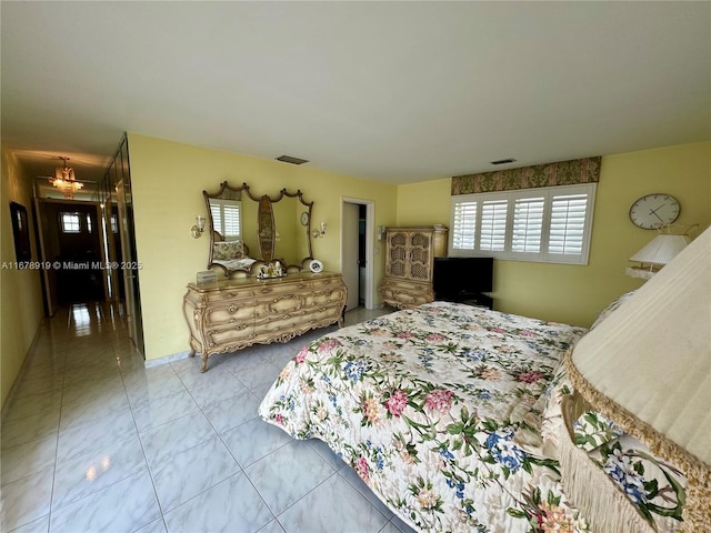 3440 NE 170th St, North Miami Beach, FL 33160 - bedroom featuring multiple windows and visible vents