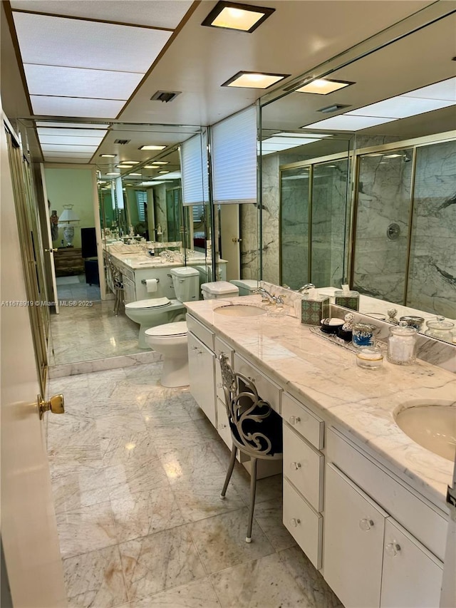 3440 NE 170th St, North Miami Beach, FL 33160 - full bath with a shower stall, toilet, a sink, and double vanity