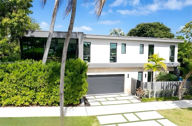 modern home featuring a garage