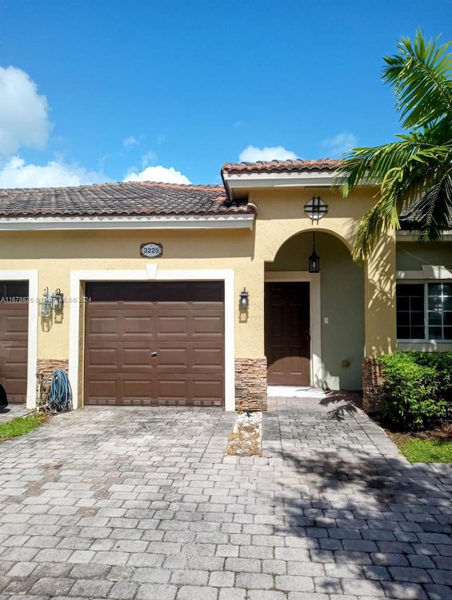 view of front of home featuring a garage